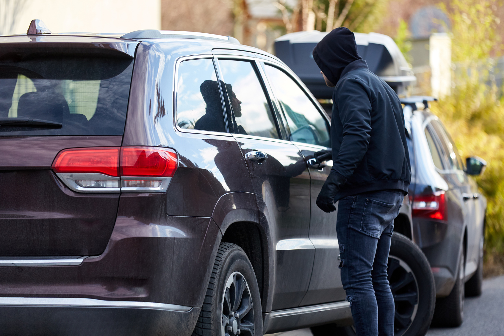 Car Thief on Car at Car Theft